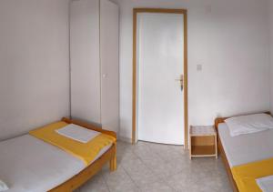 Posteľ alebo postele v izbe v ubytovaní Gama