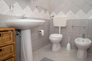 Koupelna v ubytování Casa malacala