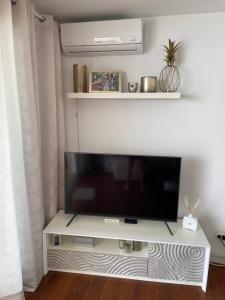 TV a/nebo společenská místnost v ubytování Beachapartment