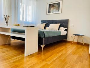 Letto o letti in una camera di Casa Fibonacci