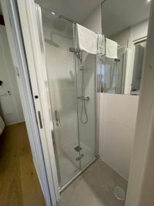 a shower with a glass door in a bathroom at Estudio en Madrid in Madrid