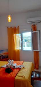 Postel nebo postele na pokoji v ubytování Ammoudaries appartment