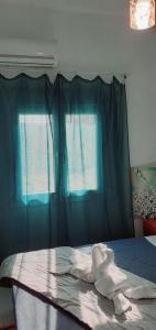 Postel nebo postele na pokoji v ubytování Ammoudaries appartment