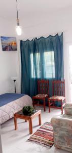 Postel nebo postele na pokoji v ubytování Ammoudaries appartment