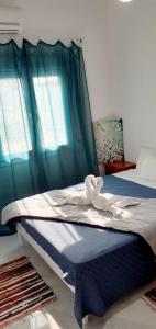 Postel nebo postele na pokoji v ubytování Ammoudaries appartment