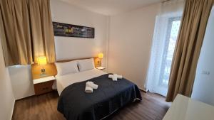Postel nebo postele na pokoji v ubytování Jafar Resort 4