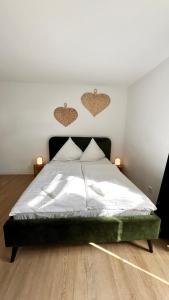 Een bed of bedden in een kamer bij Ferienwohnung Washingtonweg