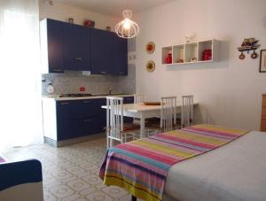 Zdjęcie z galerii obiektu Colourful studio with shared pool for 4 guests w mieście Porto Santa Margherita di Caorle