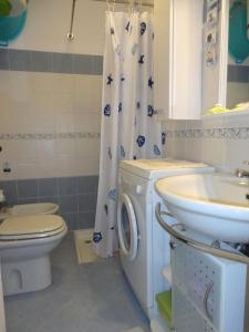 Zdjęcie z galerii obiektu Colourful studio with shared pool for 4 guests w mieście Porto Santa Margherita di Caorle +14 zdjęć