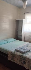 Ένα ή περισσότερα κρεβάτια σε δωμάτιο στο casas joaninha