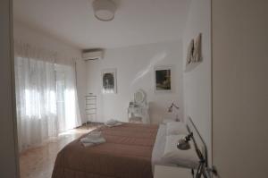 Posteľ alebo postele v izbe v ubytovaní Feeling Home