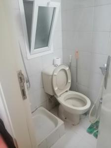 Ett badrum på ETAS Residence