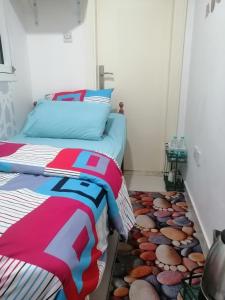 Postel nebo postele na pokoji v ubytování ETAS Residence