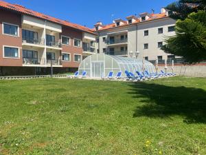 Vonkajšia záhrada v ubytovaní Apartamentos Playa Langosteira