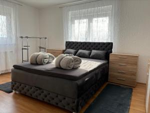 Un pat sau paturi într-o cameră la Vila Tosic