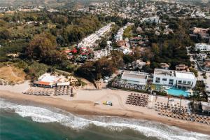 an aerial view of a beach with a resort at Anais Marbella in Marbella