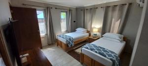 Postel nebo postele na pokoji v ubytování SEMEREL APARTMENT