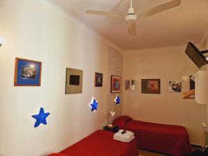 A bed or beds in a room at Casa de Huespedes Dolce Vita