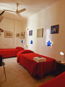 A bed or beds in a room at Casa de Huespedes Dolce Vita