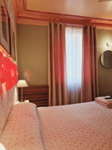 A bed or beds in a room at Casa de Huespedes Dolce Vita