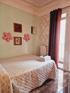 A bed or beds in a room at Casa de Huespedes Dolce Vita