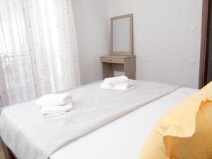 Postel nebo postele na pokoji v ubytování Brand New Apartment in Ialyssos