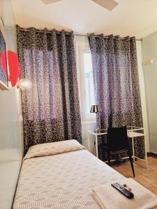 A bed or beds in a room at Casa de Huespedes Dolce Vita