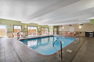 a large swimming pool in a hotel room at Holiday Inn Hotel & Suites Slidell by IHG in Slidell