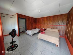 Postel nebo postele na pokoji v ubytování Hotel Gaviotas de Osa