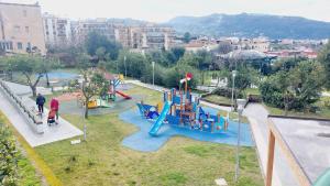 an aerial view of a park with a playground at Butterfly Appartamento in Meta