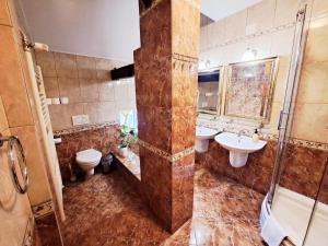 Ett badrum på Hotel Livadić