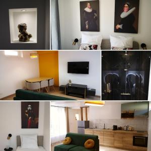 uma sala de estar com um sofá verde e um quarto com uma televisão em La promesse - T3 Hyper centre em Abbeville