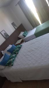 A bed or beds in a room at Hotel el huerto