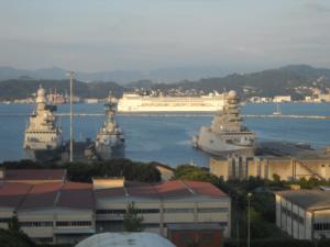 a group of ships are docked in a harbor at Giada Apartment in La Spezia