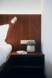 Postel nebo postele na pokoji v ubytování Hotel Reindl Suiten & Appartments
