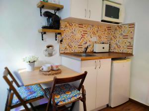 Kuchyň nebo kuchyňský kout v ubytování Apartamento Estudio Terraza Privada