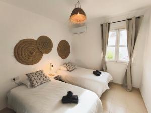 Posteľ alebo postele v izbe v ubytovaní Medina Marinas - Tú hogar con solarium privado!