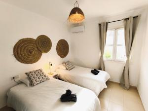 Posteľ alebo postele v izbe v ubytovaní Medina Marinas - Tú hogar con solarium privado!