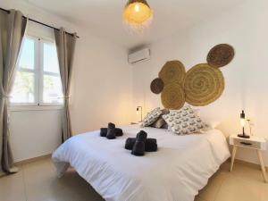 Posteľ alebo postele v izbe v ubytovaní Medina Marinas - Tú hogar con solarium privado!