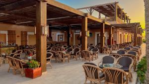 Um restaurante ou outro lugar para comer em Gemma Resort