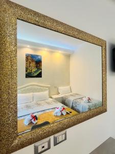 A bed or beds in a room at Santa Maria Accommodation