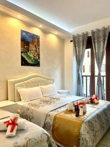 A bed or beds in a room at Santa Maria Accommodation