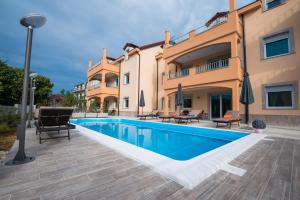 an image of a villa with a swimming pool at Villa Ljubica 2 in Vodice