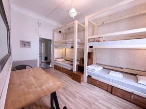 Postelja oz. postelje v sobi nastanitve Imaginary Hostel