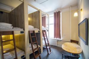 TV a/nebo společenská místnost v ubytování Imaginary Hostel