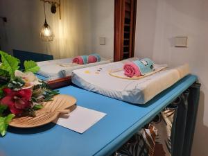 Llit o llits en una habitació de Martinique La Trinité KAZAKASSY Studio plain-pied, fonctionnel et vue mer