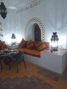 Posezení v ubytování Hotel Riad Sahara Activity