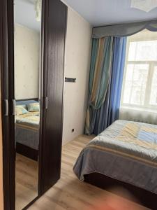 Postel nebo postele na pokoji v ubytování Apart Kesklinn