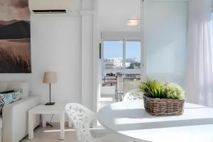 Posezení v ubytování Precioso apartamento reformado con vistas directas al mar