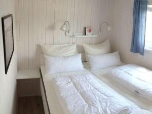 Ένα ή περισσότερα κρεβάτια σε δωμάτιο στο Houseboat Comfortable Vacation Home